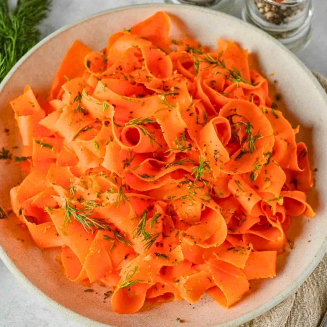 Fresh herbed carrot salad with vibrant colors and healthy ingredients