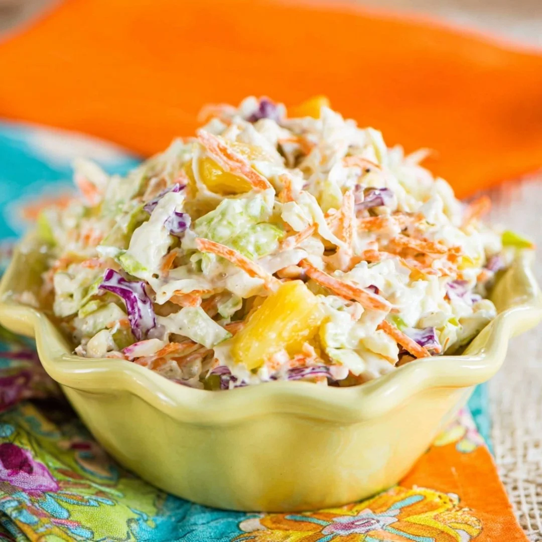 Blue_Salt_Trick_for_Men_Recipe_05 A bright, fizzy blue beverage with granulated salt crystals and a clear jar on a granite surface.