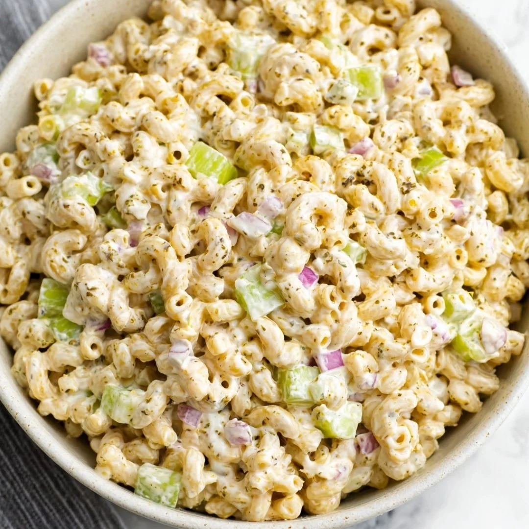 Bowl of Old-Fashioned Creamy Macaroni Salad with fresh ingredients