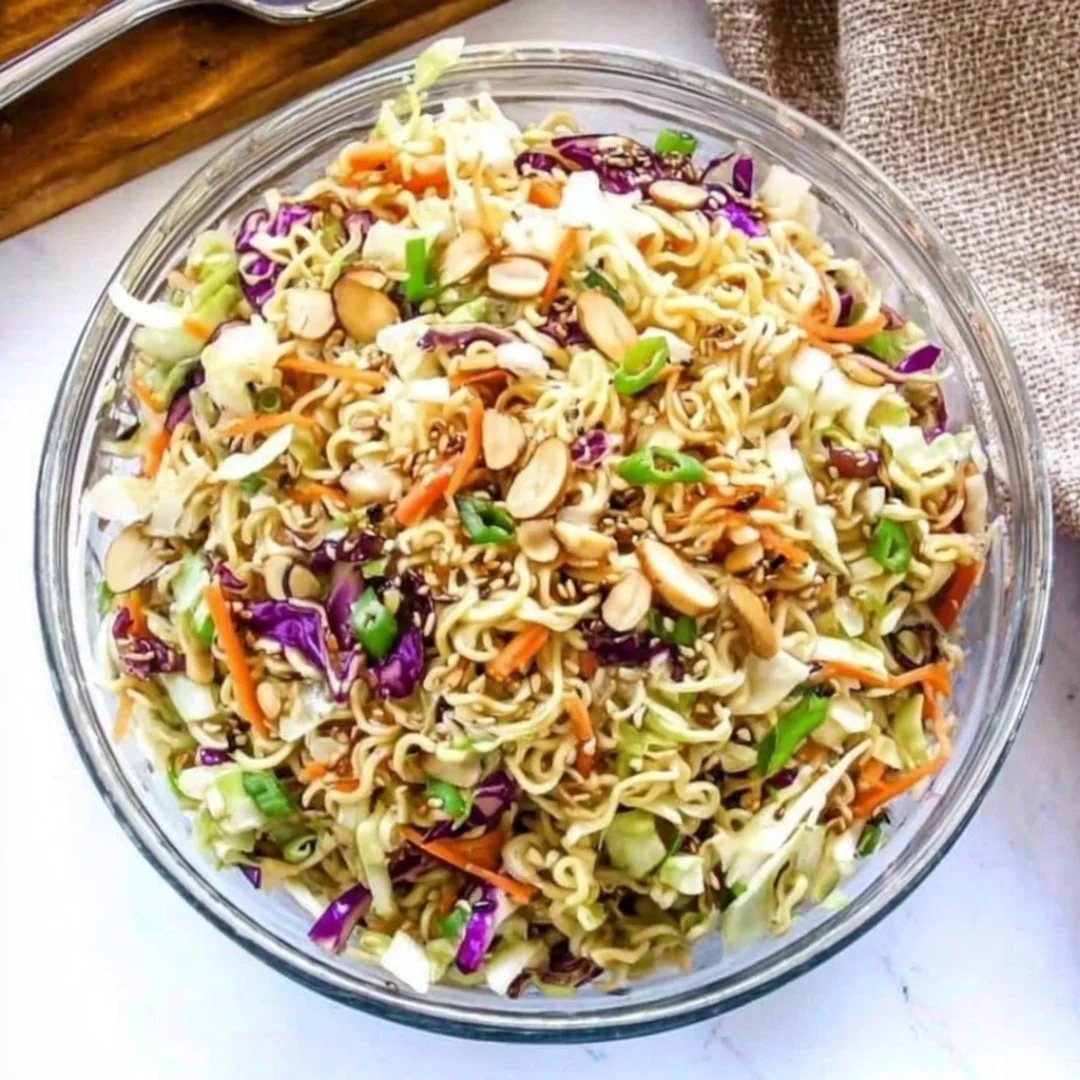 Delicious Pioneer Woman ramen noodle salad in a bowl with colorful vegetables